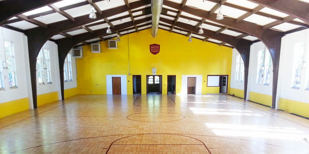 Clean and bright school gymnasium.